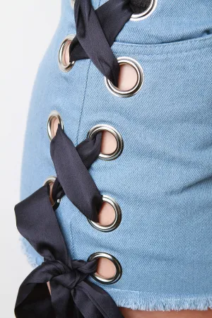 Side Ribbon Eyelet Lace-Up Frayed Denim Shorts